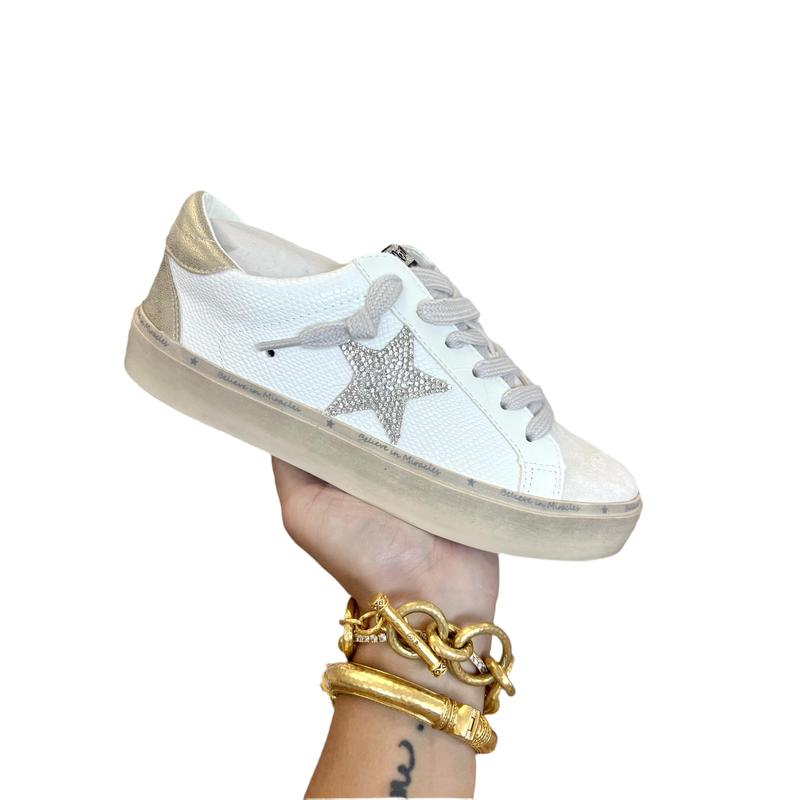 White gold star sneakers